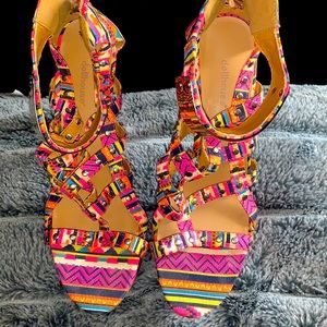 Woman’s multi colored straps heels. Super cute!!